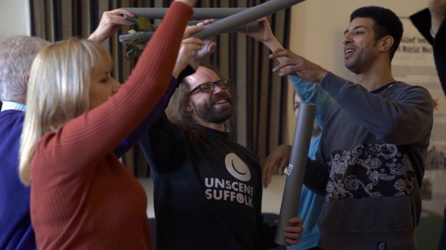 Nathan Geering with cast members rehearsing 'The Tree of Dreams''. Credit Daniel McKee